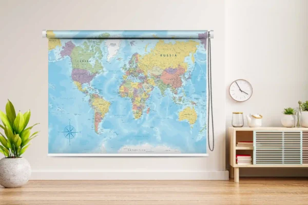 World Map Printed Roller Window Blind hanging in a cozy children’s room with toys and furniture.