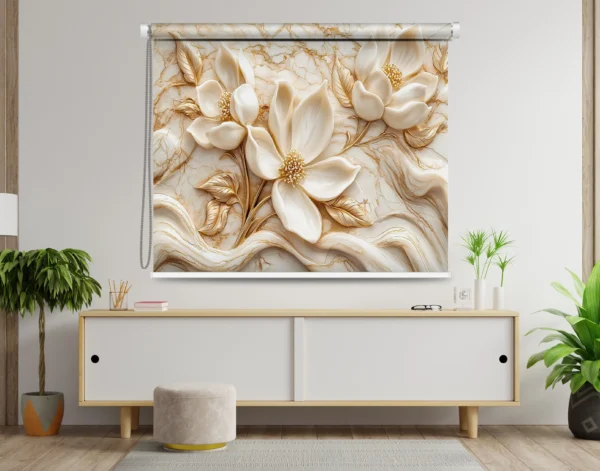 A luxury roller blind with a Gold & White Accents 3D floral design in gold and white, featuring a marble-textured background, is displayed in a modern living room.