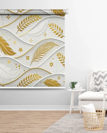 Luxury roller blind with intricate gold leaf pattern on a soft white background, displayed in a cozy modern living room.
