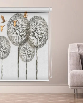 Roller blind with intricate tree designs and metallic bird accents on a neutral background in a modern living room.