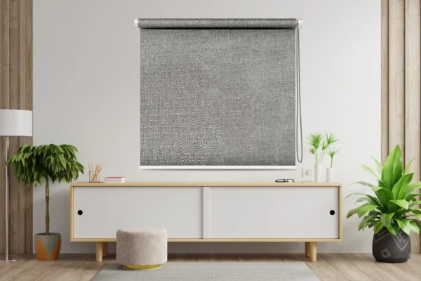 Sleek and Modern Blackout Roller Blinds with a textured gray design, perfect for light control and privacy in a contemporary living room setting.