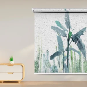 Tropical leaf roller blind with banana leaf and cactus print in green tones, offering a refreshing nature-inspired look for modern interiors.