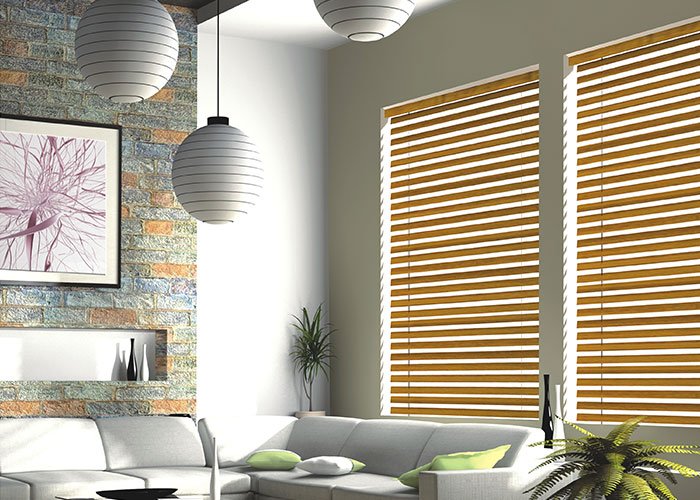 Elegant Golden Brown wooden window blinds in a modern living room.