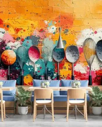 Culinary Art Splash Wallpaper mural featuring painted spoons, whisks, and spatulas with a splash-art background in a restaurant dining setting